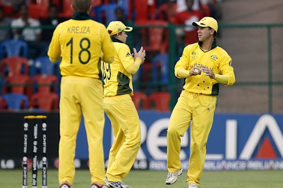 Ricky Ponting and Steve Smith after the pair collided while going for a catch in the 2011 World Cup.