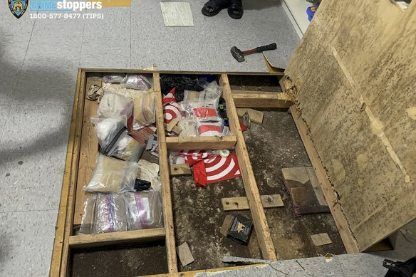 A trapdoor revealed narcotics, including fentanyl, and cause   paraphernalia stored successful  the level  of a Bronx daycare centre.