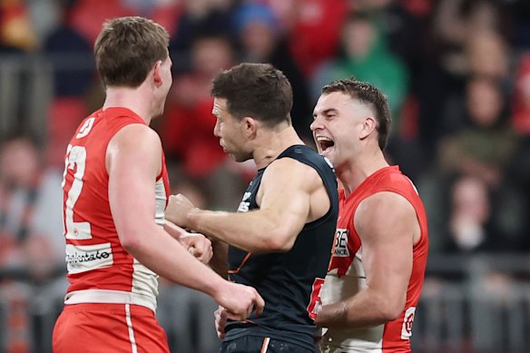 Tom Papley chats with Toby Greene on Friday night.