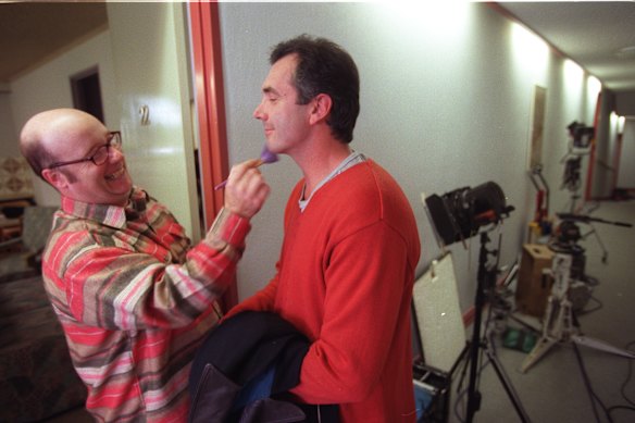 Alan Fletcher, playing Dr Karl Kennedy on the set of Neighbours, in 1998.