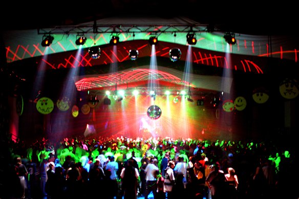 The punters get live and sweaty at a Docklands rave in 2001.