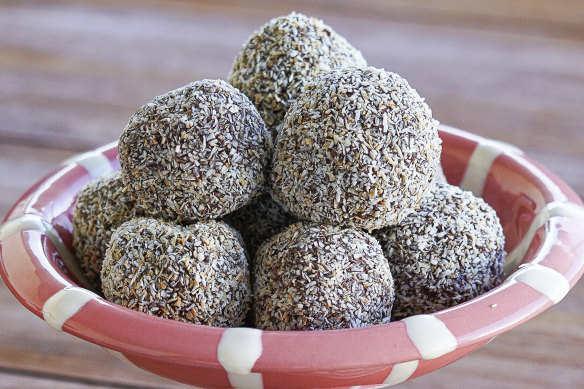  Serve the rum balls with extra toasted coconut.