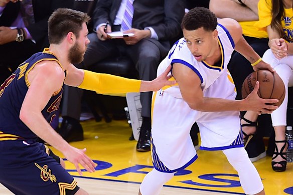 Stephen Curry under pressure from Matthew Dellavedova in the 2015 NBA finals.