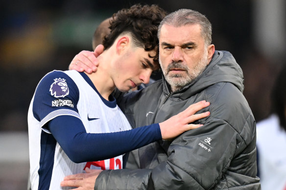 Ange Postecoglou consoles Archie Gray after Spurs loss.