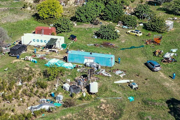 Police at the Thologolong property on Tuesday morning.