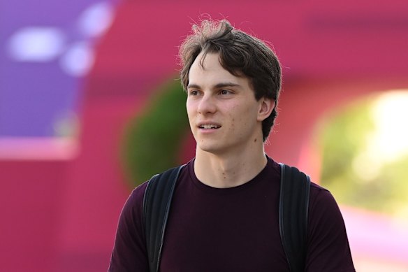 Oscar Piastri arrives in the paddock in Qatar.