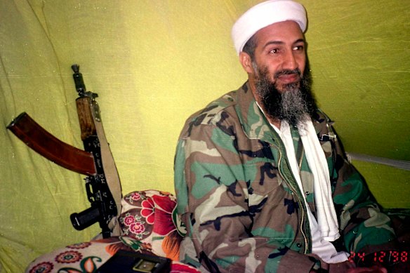 Bin Laden speaks to reporters in the mountains of Helmand province in southern Afghanistan in 1998.
