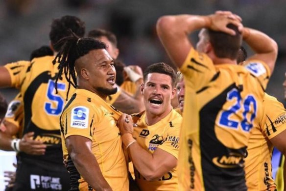 Brandon Paenga-Amosa (left) and Western Force teammates celebrate their thrilling win the capital.