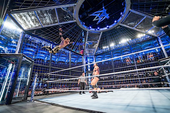 Logan Paul in action against Drew McIntyre during the WWE Elimination Chamber in Perth last year.