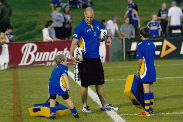 Brad Arthur with his sons and ballboys, Matt and Jake Arthur before they made it to the NRL as adults.