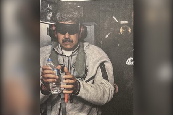 A photo posted by US President Donald Trump to Truth Social reportedly showing Venezuelan President Nicolas Maduro aboard the USS Iwo Jima warship after he was captured by US forces.