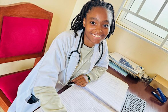 Irene, now 25, pictured in 2025 at work as a nurse practitioner at a Tanzanian hospital.