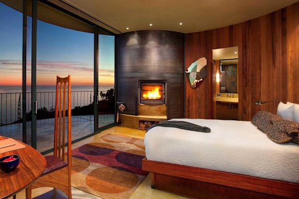 You can spot whales passing in the sea below from the comfort of your bedroom.