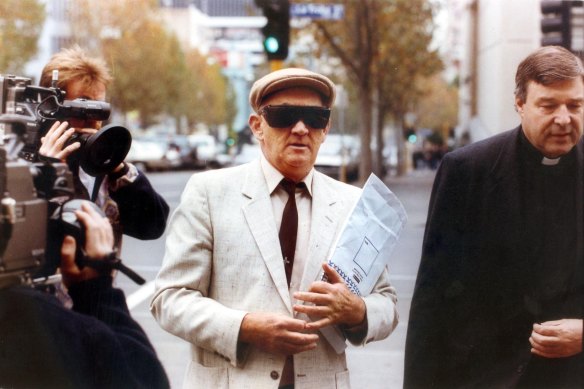 Paedophile priest Gerald Ridsdale (left) outside court with George Pell (right) in 1993.