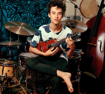 Collier in the music room of his family’s home in London.