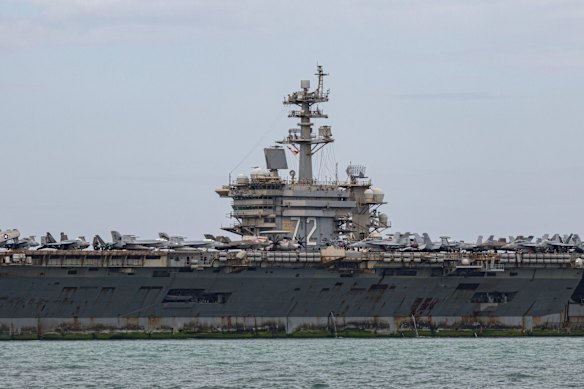 The Lincoln approaches Laem Chabang Port in Thailand bearing the scars of its mammoth voyage.