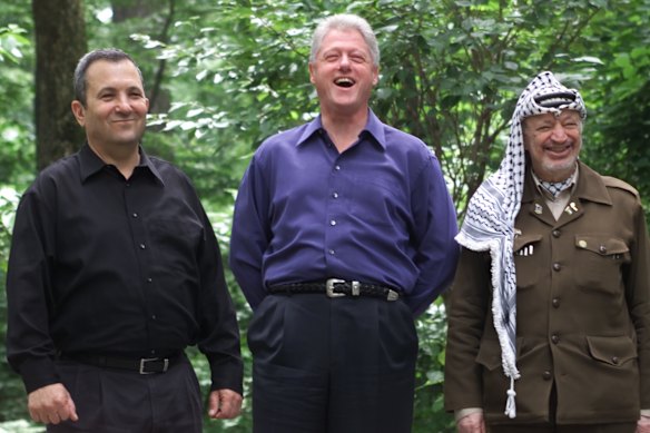 Ehud Barak, then the Israeli prime minister, with US president Bill Clinton and Palestinian leader Yasser Arafat as they tried and failed to strike a historic peace deal at Camp David in 2000.