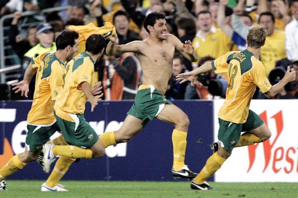 A shirtless John Aloisi celebrates scoring the penalty against Uruguay that put Australia into the 2006 World Cup.