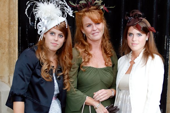 Sarah Ferguson attends a wedding with her daughters, Princess Beatrice (left) and Princess Eugenie, in 2007.
