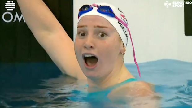 Mollie O’Callaghan reacts to breaking the women’s 200m freestyle world record (shortcourse).