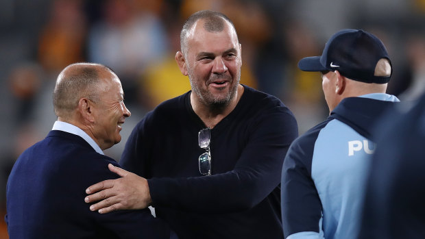 Michael Cheika greets Eddie Jones in 2023. Could Cheika also make a return as Wallabies coach?