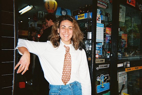 Julia Sarantis outside of Sydney Super8 wearing a tie that previous owner Christopher Tiffany gifted her.