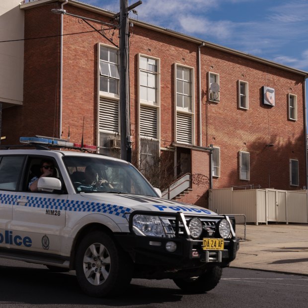 A police vehicle drives through the southern NSW town of Cooma, where 95-year-old Clare Nowland died after she was allegedly Tasered last week. 