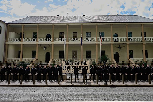 The National Socialist Network holding a rally outside NSW Parliament in Sydney.
