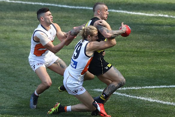 The Giants’ best two players in the 2019 grand final loss, Tim Taranto and Nick Haynes, tackle Richmond star Dustin Martin.