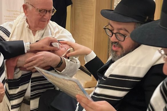 Rabbi Eli Schlanger (right).