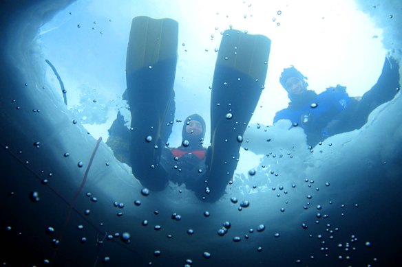 Sink into lake waters in the French Alps for a novel winter experience.