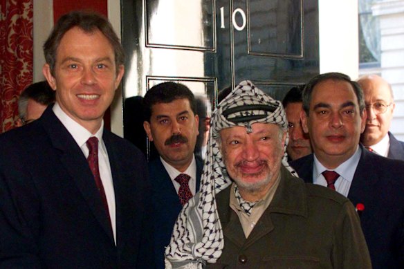 Then British Prime Minister Tony Blair with then-Palestinian leader Yasser Arafat for talks in 1998. Arafat and Israeli Prime Minister Benjamin Netanyahu were in London to break an earlier stalemate.