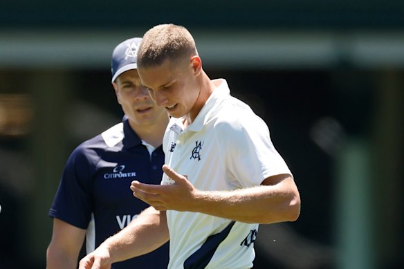Kellaway inspects the damage from a Mitchell Starc bumper at the SCG on November 10.