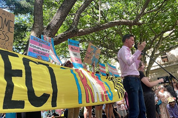 Shadow health minister Mark Bailey speaks at a rally in Brisbane last year to reinstate healthcare for trans youth. 