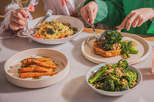Crab spaghetti, honey-glazed carrots and market greens with rocket basil pesto.