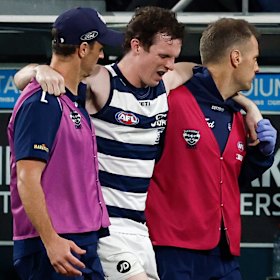 Max Holmes was helped from the ground by trainers during the Cats’ clash with the Saints in July.