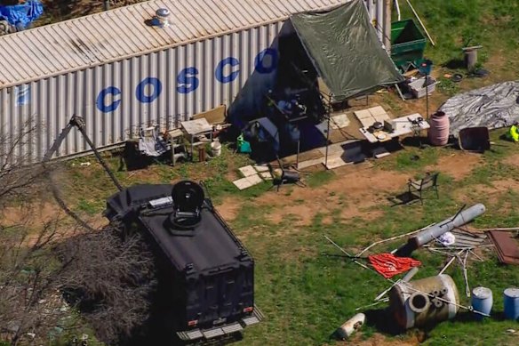 The BearCat snorkel bust a hole in the shipping container to deploy gas and flash bangs.