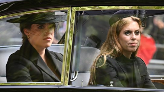 Princesses Beatrice and Eugenie follow the coffin of Queen Elizabeth II in 2022.