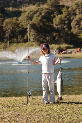 A small Wini Heatley after catching a big fish.