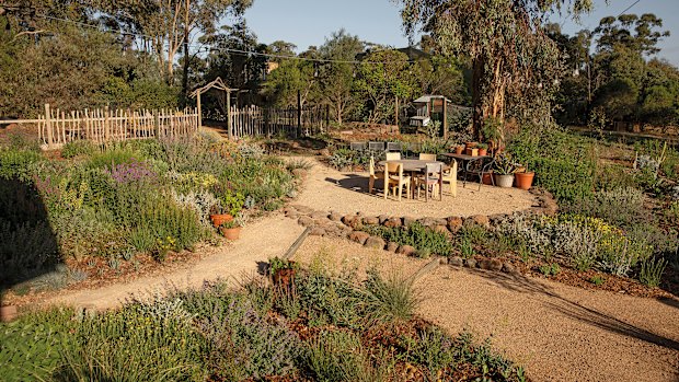 In his own garden, Pilgrim has retained existing trees to forge a connection to the wider landscape