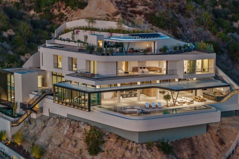 The mansion hovers above Sunset Boulevard in the West Hollywood Hills.