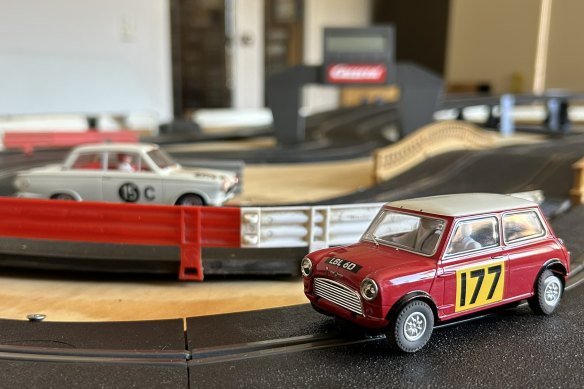A Mini Cooper in the foreground, and in the background a Ford Cortina Mk I (a car the author once owned in real life).