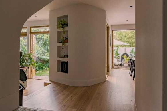A new two-storey extension to the west shields the home from heat and noise while optimising northern light and cross-ventilation.