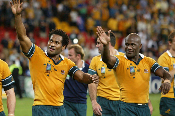 Lote Tuqiri and Wendell Sailor celebrate a win during the 2003 Rugby World Cup in Australia.