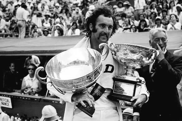 Mark Edmondson with the spoils of victory after his remarkable win in the men’s singles at the 1976 Australian Open.