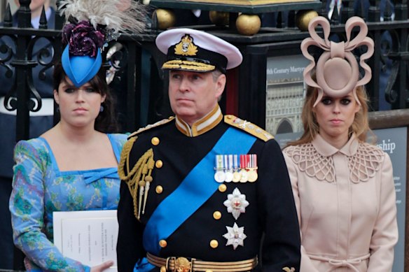 Prince Andrew and his daughters Princess Eugenie, left, and Princess Beatrice at the wedding of the Prince William and Catherine, Princess of Wales in 2011.
