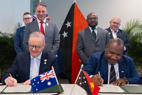 Prime Minister Anthony Albanese and his PNG counterpart James Marape signing a communique in Port Moresby today. The PM failed to sign a new bilateral defence treaty with PNG during his Port Moresby trip.