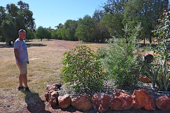 Bom near the garden beds he spent hours replanting over summer in preparation for the peak travel season. 