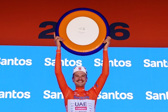 Australian rider Jay Vine , of UAE Team Emirates, celebrates his win in the Santos Tour Down Under.