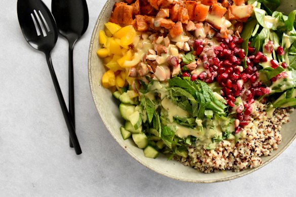 Creamy tahini dressing ties everything together in this sweet potato, quinoa and apple salad.
